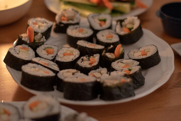 Fresh Homemade Sushi Roll against old wooden table.