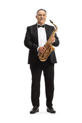 Full length portrait of a mature musician holding a sax and smiling