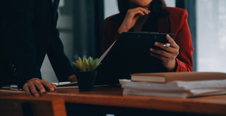 Entrepreneurs and business people conference in modern meeting room, happy multiracial coworkers have fun cooperating working together at office meeting, asian teamwork concept