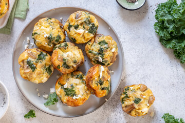 Vegetarian egg muffins with mushroom, kale and feta cheese for Breakfast