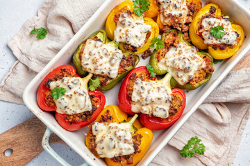 Colorful peppers stuffed with meat and bulgur