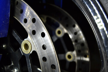 Brake discs of sport bike close up
