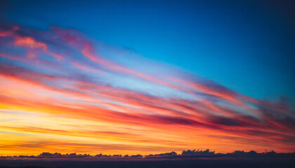 Abstract vivid sunset sky, a dynamic blend of warm hues, evokes emotions of tranquility and wonder