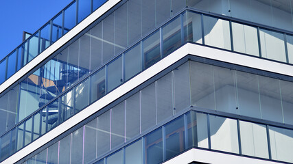 Fototapeta premium Modern architecture of urban residential apartment building. Apartment building exterior, residential house facade.