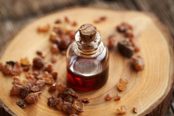 A bottle of essential oil with myrrh resin