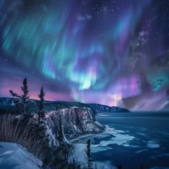 Tuinposter Majestic Aurora Borealis Over Snowy Cliff and Frozen Lake © HustlePlayground