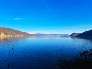 Obraz premium Horizontal photo of a lake formed on Danube river near Golubac town and fortress