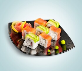 Plate with delicious tasty fresh sushi dish
