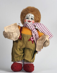 Vintage German doll red-haired white clown with newspapers in hands. - 740302580