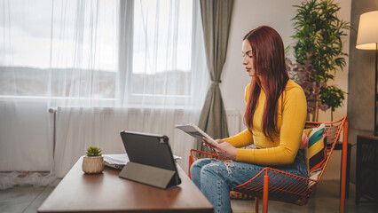 young caucasian woman student study at home learn exam prepare lesson