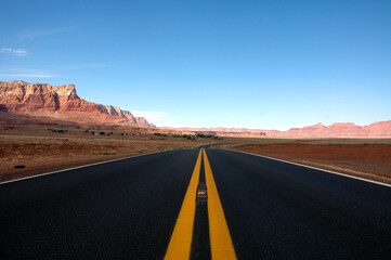Traveling Down the Highway Through the Distant Mountains in the Arizona Desert