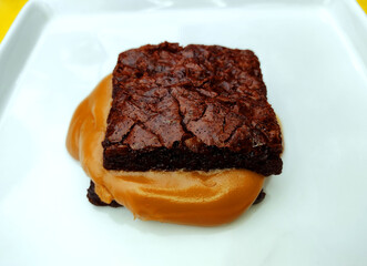 Chocolate brownie with dulce de leche filling.