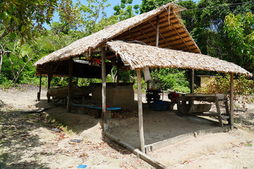 Indigenous hut made from palm leaves with a large roasting oven. It is used by an indigenous family...