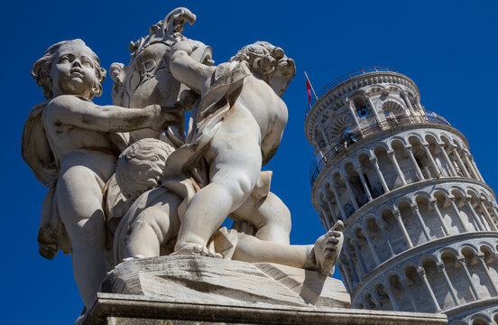 Fontana dei Putti (Fountain with Angels) and the Campanile (Leaning tower), Piazza dei Miracoli, Pisa, Italy