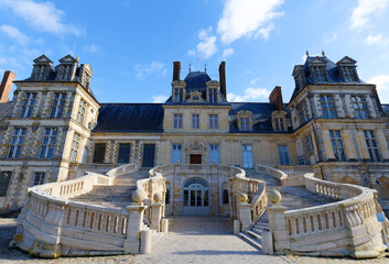 Principal staircase of Fontainebleau palace , residence of French monarchs . It designated as...