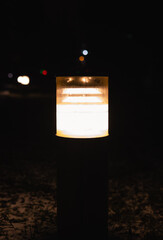 Street lamp glowing at night