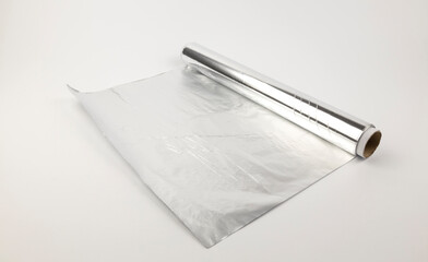 A roll of foil for baking. Aluminum foil. Home baking concept.
