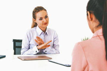 Two young business women in meeting at office table for job application and business agreement....
