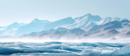 Fototapeta na wymiar A stunning view of a glistening mountain range covered in snow and ice, set against the frozen Lake Baikal.