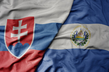 big waving national colorful flag of el salvador and national flag of slovakia . - obrazy, fototapety, plakaty