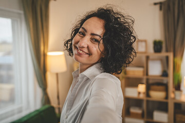 Mature caucasian woman wear white shirt happy smile portrait close up