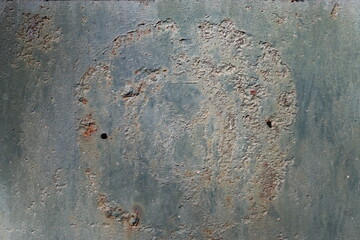 ancient rusty wrought ornamented metal surface