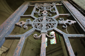 corroded wrought metal fence closeup
