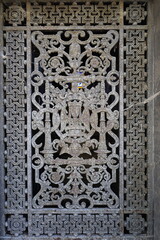 weatherd metal texture , wrought ornamented fence closep 