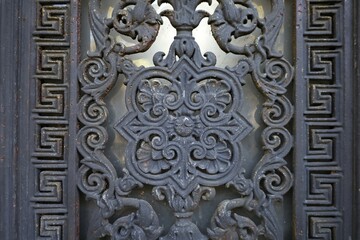 close up ancient weathered wrought metal  ornaments 