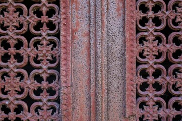 close up ancient weathered wrought metal  ornaments 