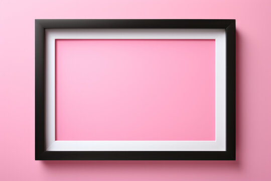 Picture frame on a pink background
