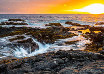Fototapeta premium Cliffside Drains on OTEC Beach, Hawaii Island, Hawaii, USA