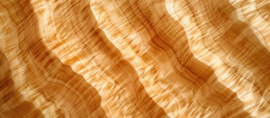 This close-up photo showcases the highly valued and intricate wood grain pattern of curly or flame maple, also known as tiger maple, commonly used in woodworking.