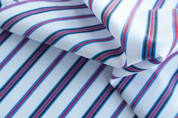 Obraz premium Red and Blue Stripes line texture background, fabric texture, textile pattern, curvy texture background, realistic, close up photography, abstract background