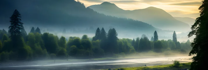 Fotobehang Magical Mornings: A Quaint River Winding through a Misty Mountainous Landscape at Dawn © Franklin