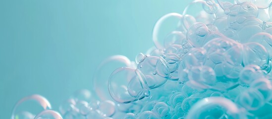 Fluid soap bubbles are floating underwater in a sea of aqua liquid on an electric blue background