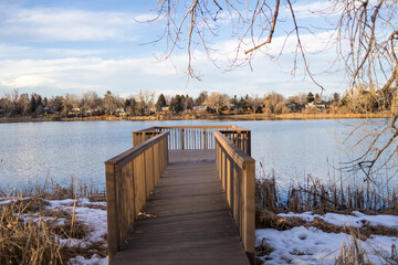 Naklejka premium wooden bridge over the lake