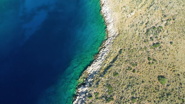 The edge of Cape Tenare on the Mediterranean Sea in Europe, Greece, Peloponnese, Mani in summer on a sunny day.