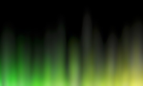 Abstract blurred background image of green, yellow colors gradient used as an illustration. Designing posters or advertisements.