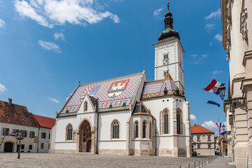 Fototapeta na wymiar St Mark's cathedral with ornate tiled roof with two Croatian coats of arms Croatia