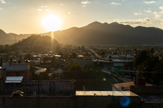 Sunset Over Mountain Town, Golden Hour Glow, Urban Landscape of San Cristobal de las Casas in Mexico