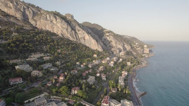 Village of Menton near French Italian border Maritime Alps in the Mediterranean Sea, Aerial dolly left shot