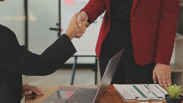 Close-up view of business partnership handshake, Photo of two businessman handshaking process. Successful deal after great meeting. Horizontal, flare effect, blurred background handshake concept.