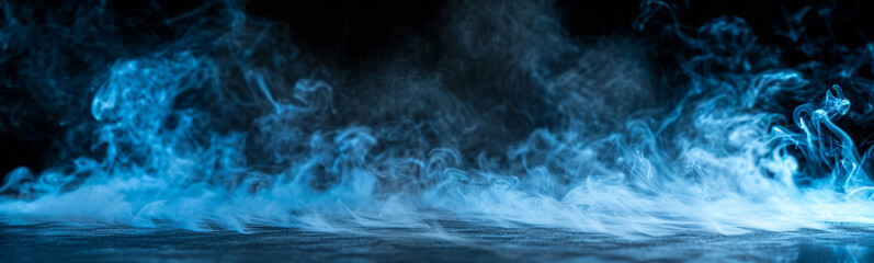 Obraz premium Ground blue smoke on black background. Dark smoke banner