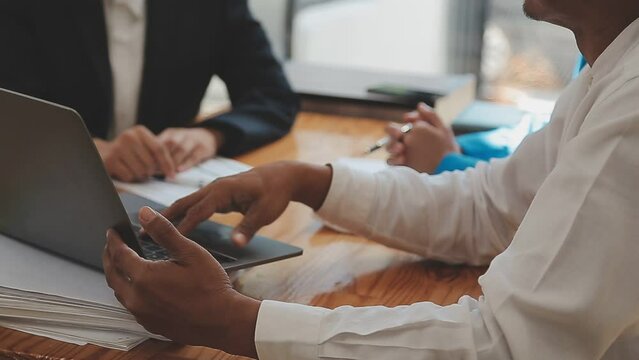Team of business people are meeting to analyze data for marketing plan,Market research reports and income statistics, Financial and Accounting concept.