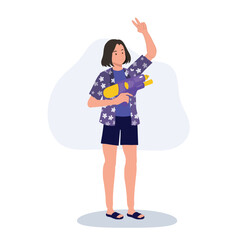 Joyful Asian Woman Enjoying Songkarn Festival Water Fight. woman with Water Gun