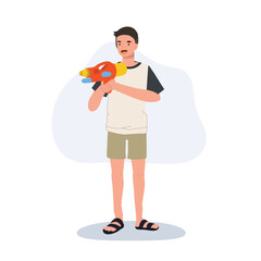 Joyful man Enjoying Songkarn Festival Water Fight. man with Water Gun