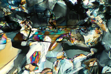 Abstract micrograph of methionine crystals made with a polarizing microscope.
