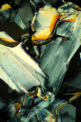 Abstract micrograph of methionine crystals made with a polarizing microscope.