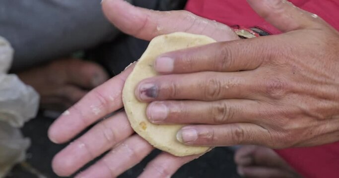Preparation of 'Prasad' an offering to gods in Chaurasi Temple in India